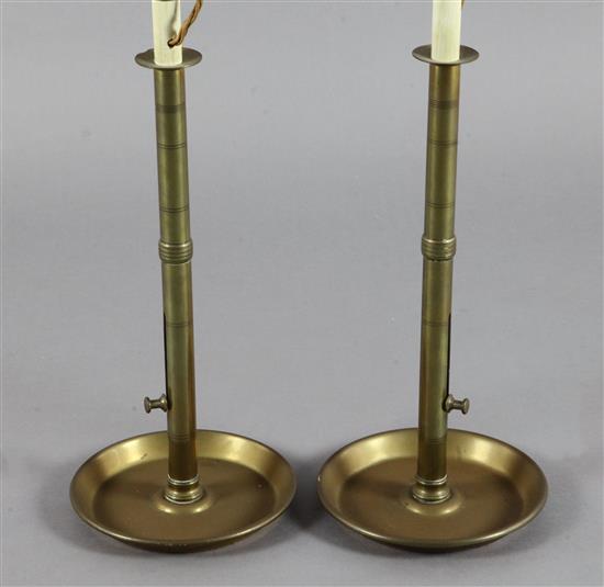 A pair of tall brass pulpit chambersticks, c.1820, 17in.